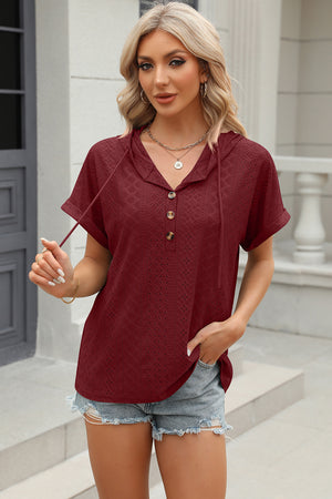Burgundy perforated henley hooded tee with short sleeves and button placket.