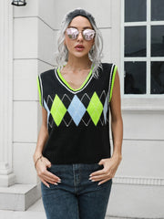 Argyle knit sweater vest with neon green trim and v-neck.