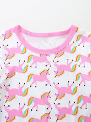 Girls white unicorn print t-shirt with pink trim and crew neck.