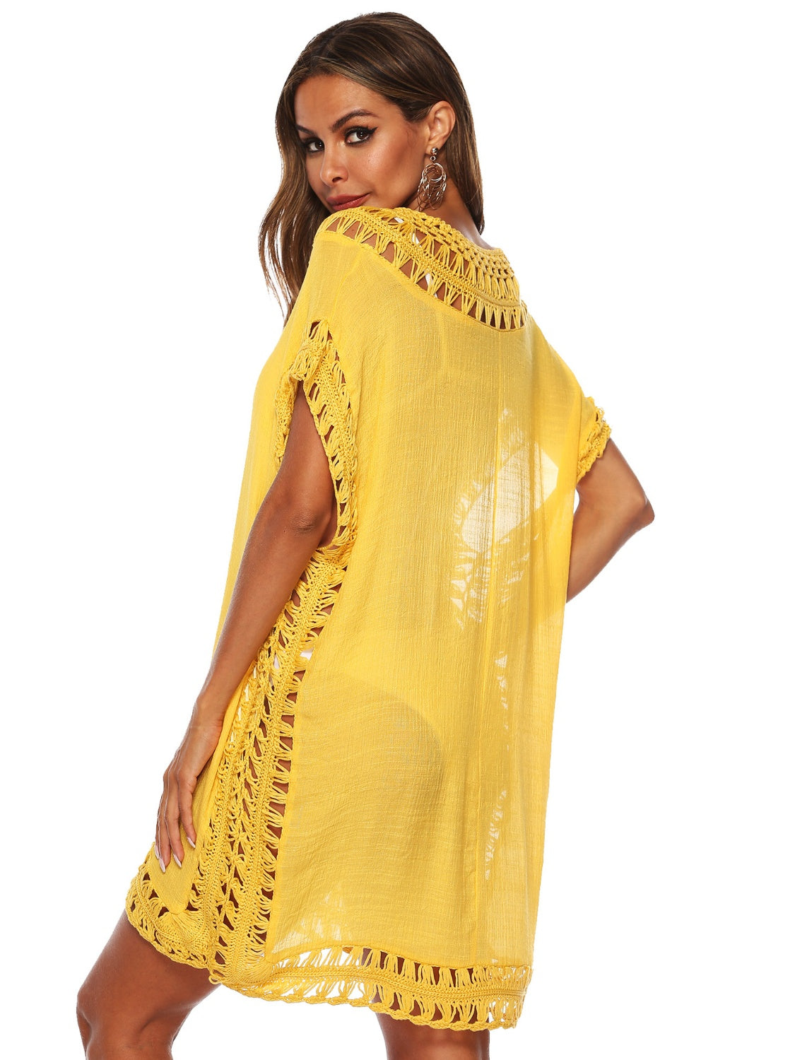 Yellow kaftan cover-up with crochet trim and fringe hem.
