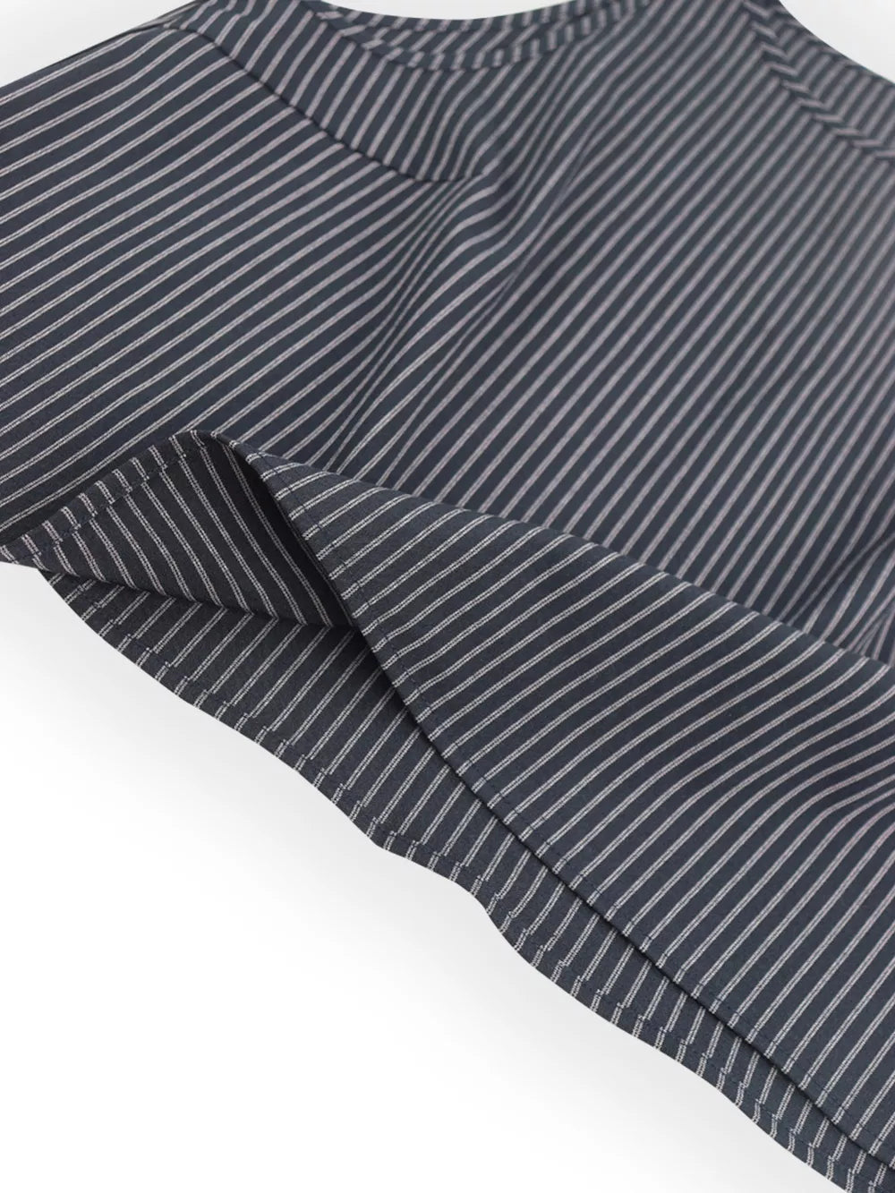 Chic black striped sleeveless top and wide-leg pants set detail.