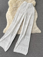 White crochet wide-leg pants with diamond pattern and drawstring waist.