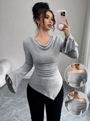Gray ribbed asymmetrical cowl neck top with bell sleeves and ruched sides.