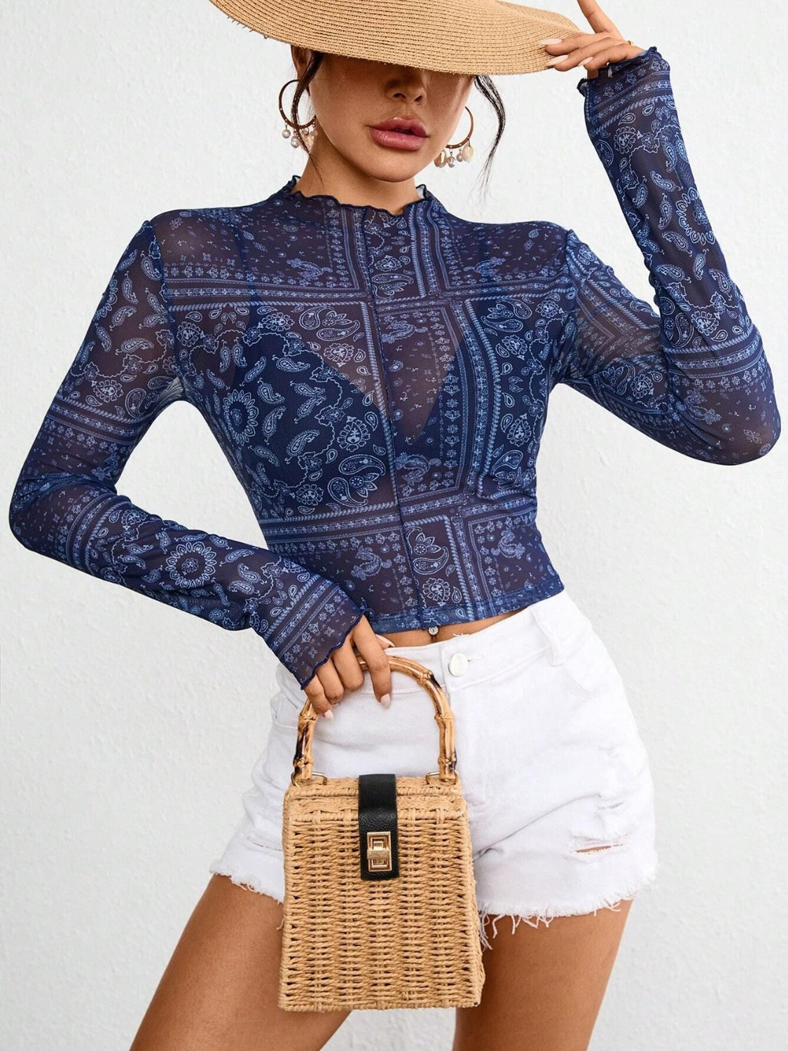 Bandana print mesh mock neck top in dark blue with lettuce trim, long sleeves.
