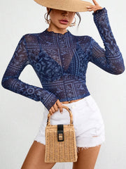 Bandana print mesh mock neck top in dark blue with lettuce trim, long sleeves.