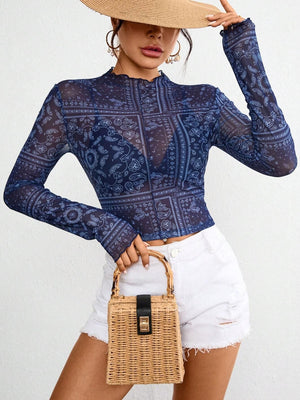 Bandana print mesh mock neck top in dark blue with lettuce trim, long sleeves.