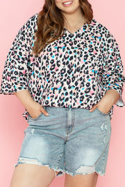 Color Pop Leopard Print Batwing Blouse with V-neck and 3/4 sleeves.