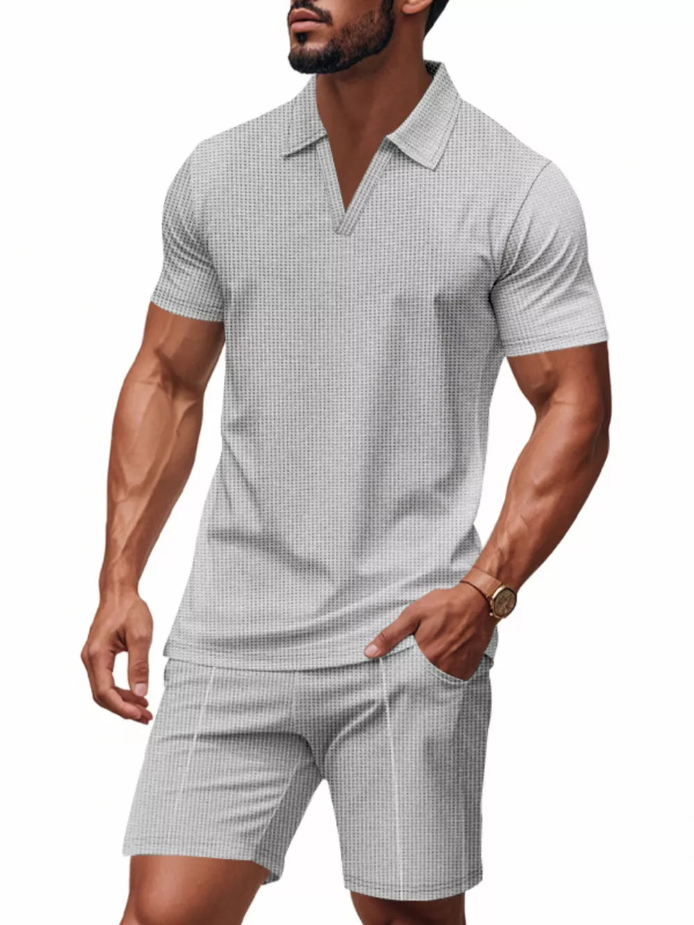 Men's grey textured polo shirt and shorts ensemble with a V-neck and short sleeves.