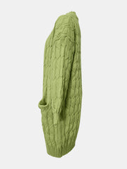 Green cable knit duster cardigan with pockets and textured acrylic knit.