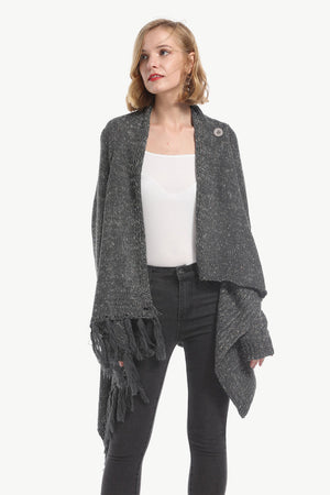 Asymmetric fringe knit cardigan in dark gray acrylic with a single button closure.