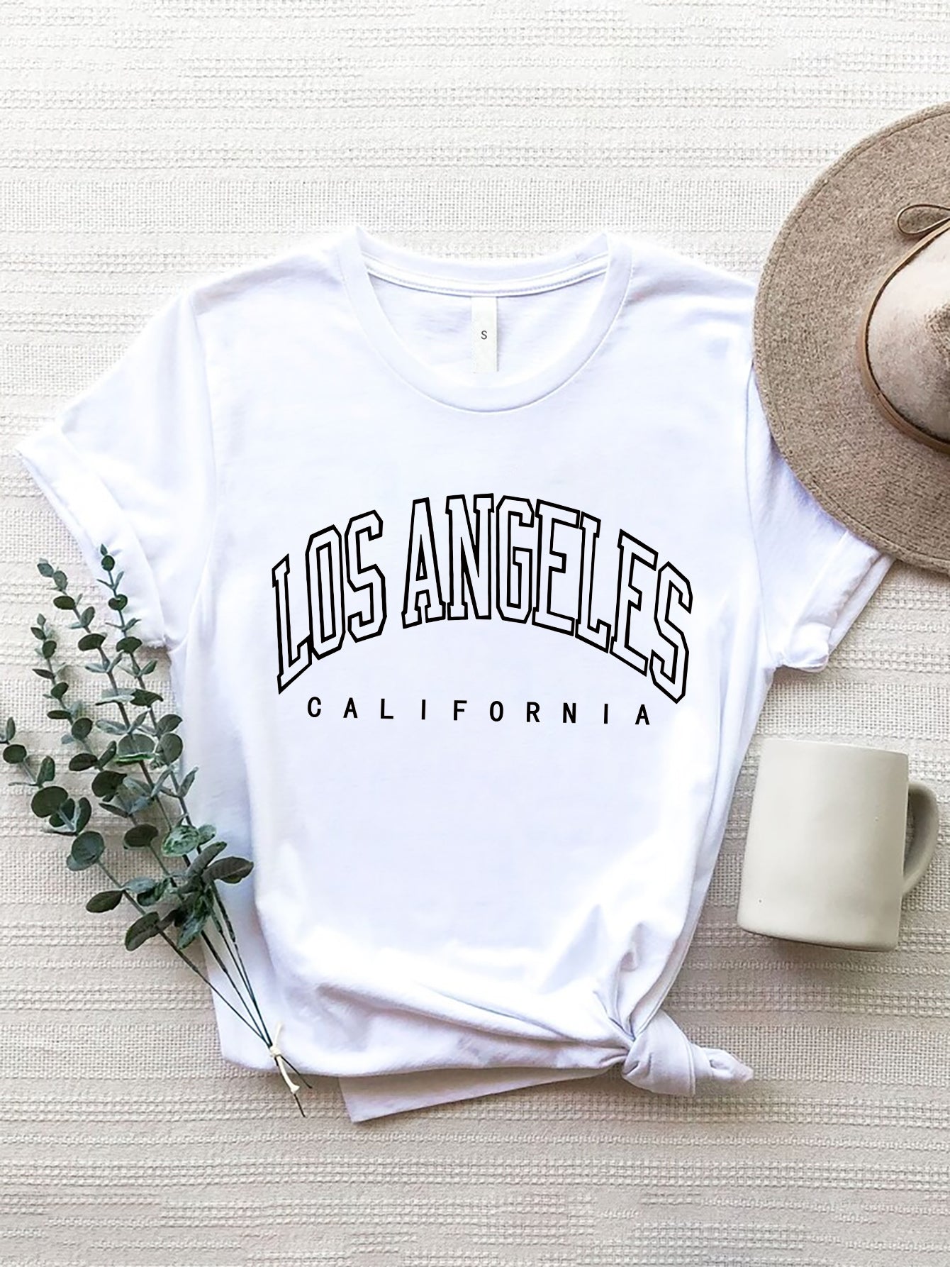 White polyester t-shirt with black Los Angeles California graphic print