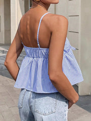 Blue striped peplum cami with tie-front detail and spaghetti straps.