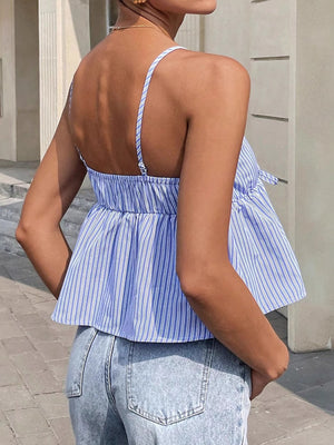 Blue striped peplum cami with tie-front detail and spaghetti straps.