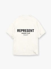 Oversized ivory graphic tee with black "REPRESENT OWNERS' CLUB" text and smaller print.