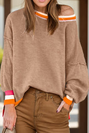 Dust Storm knit sweater with balloon sleeves and colorblock trim on neckline and cuffs.