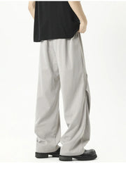 Plus-size grey loose fit drawstring pants with a casual, relaxed cut.