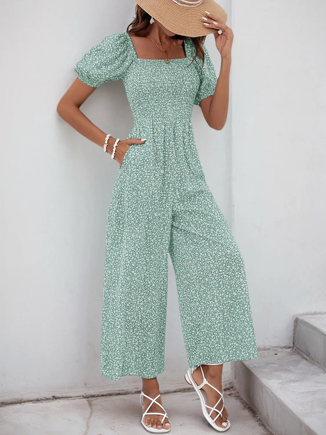 Light green floral print jumpsuit with smocked bodice and puff sleeves