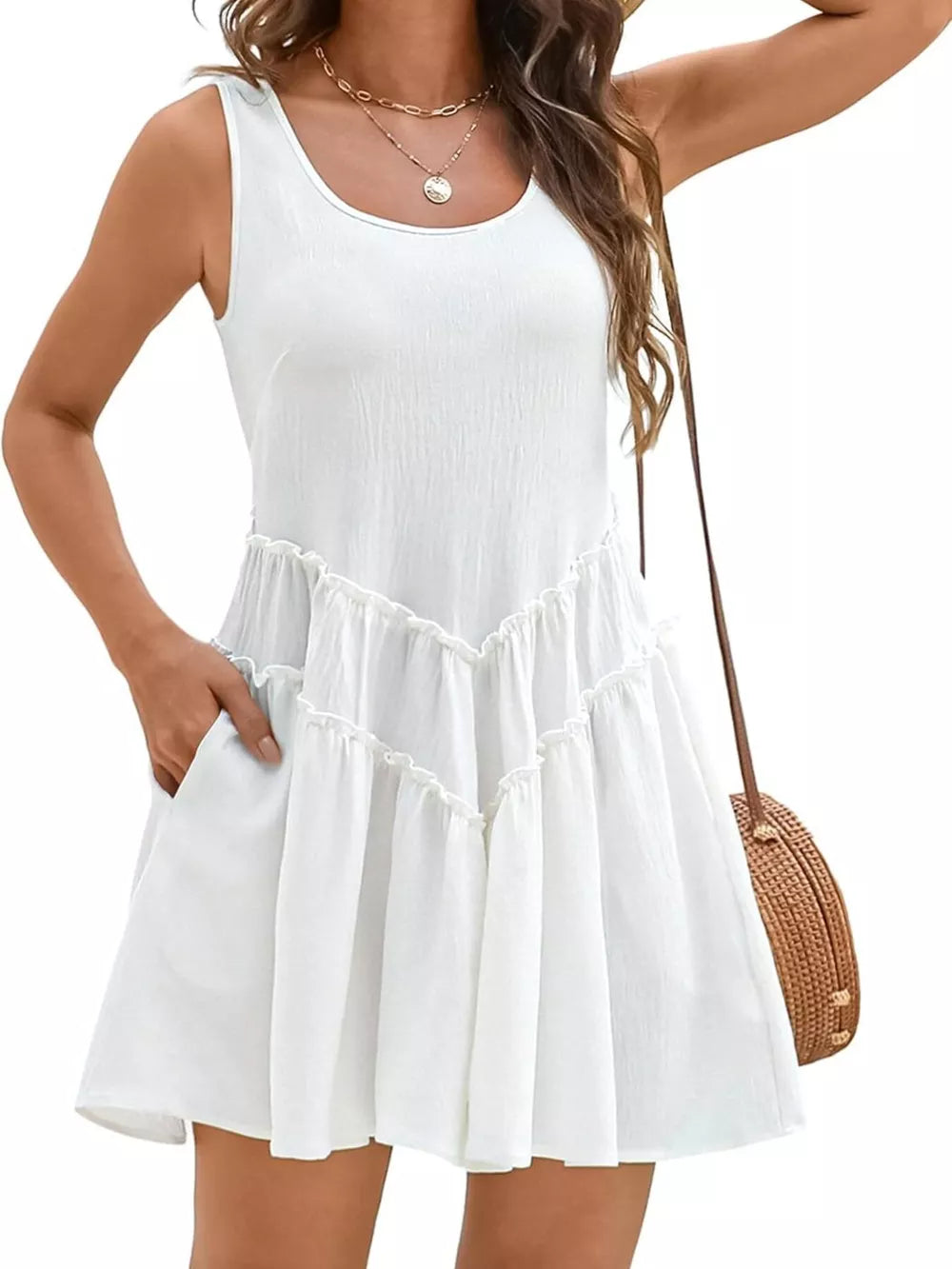 White frill tiered mini dress with pockets and a scoop neckline.