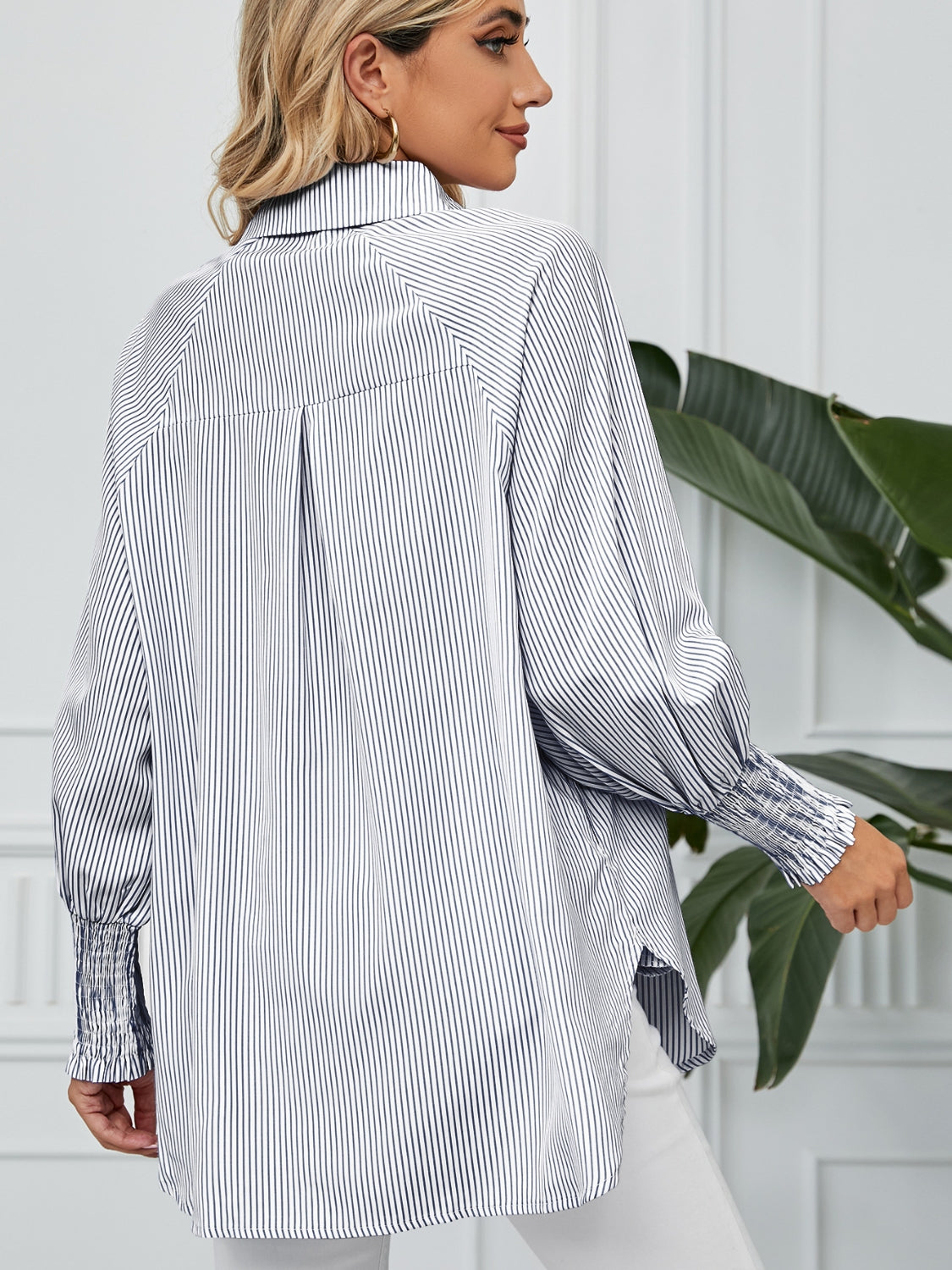 Balloon sleeve stripe shirt with button-up front and smocked cuffs.