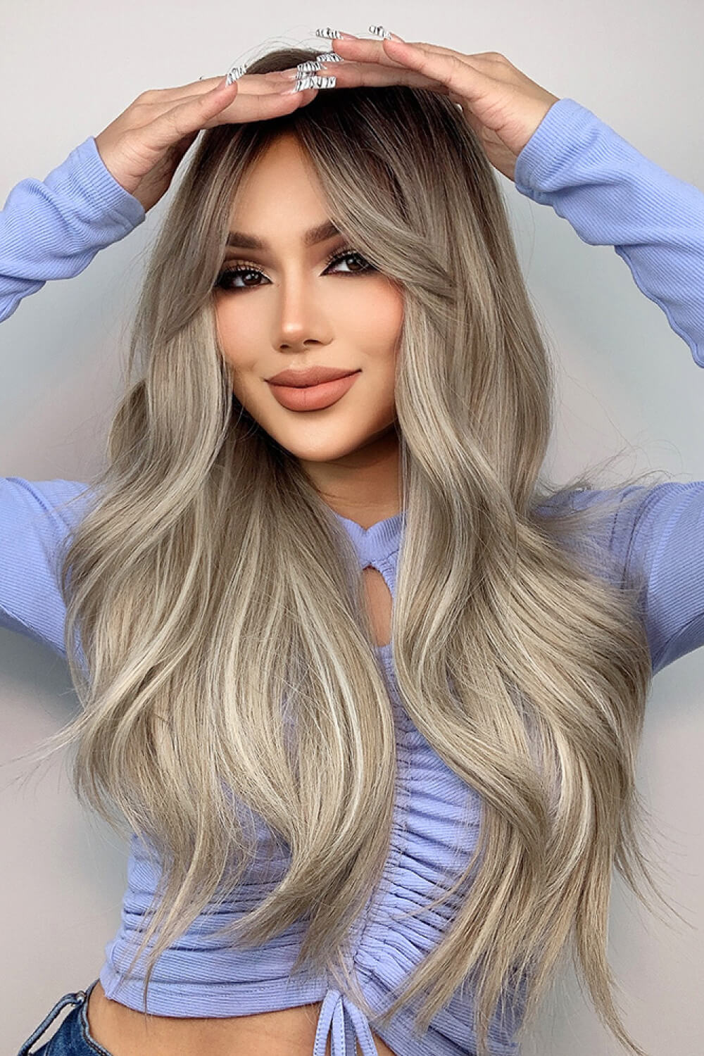 Ombre Wave Frontal Wig in Ash Blonde Balayage with loose waves and face-framing layers.