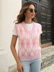 Argyle knit vest in blush pink with heart motif, V-neck, acrylic.