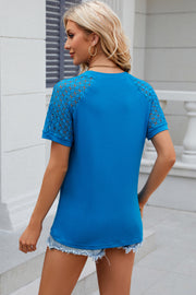 Royal blue ribbed tee with lace raglan sleeves and crew neck.
