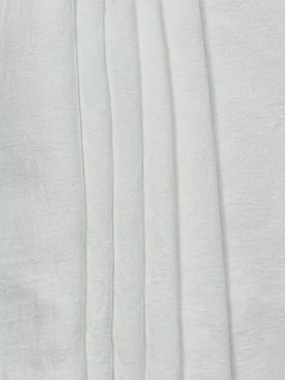 White relaxed wide-leg maternity pants with vertical pleats and drawstring detail.