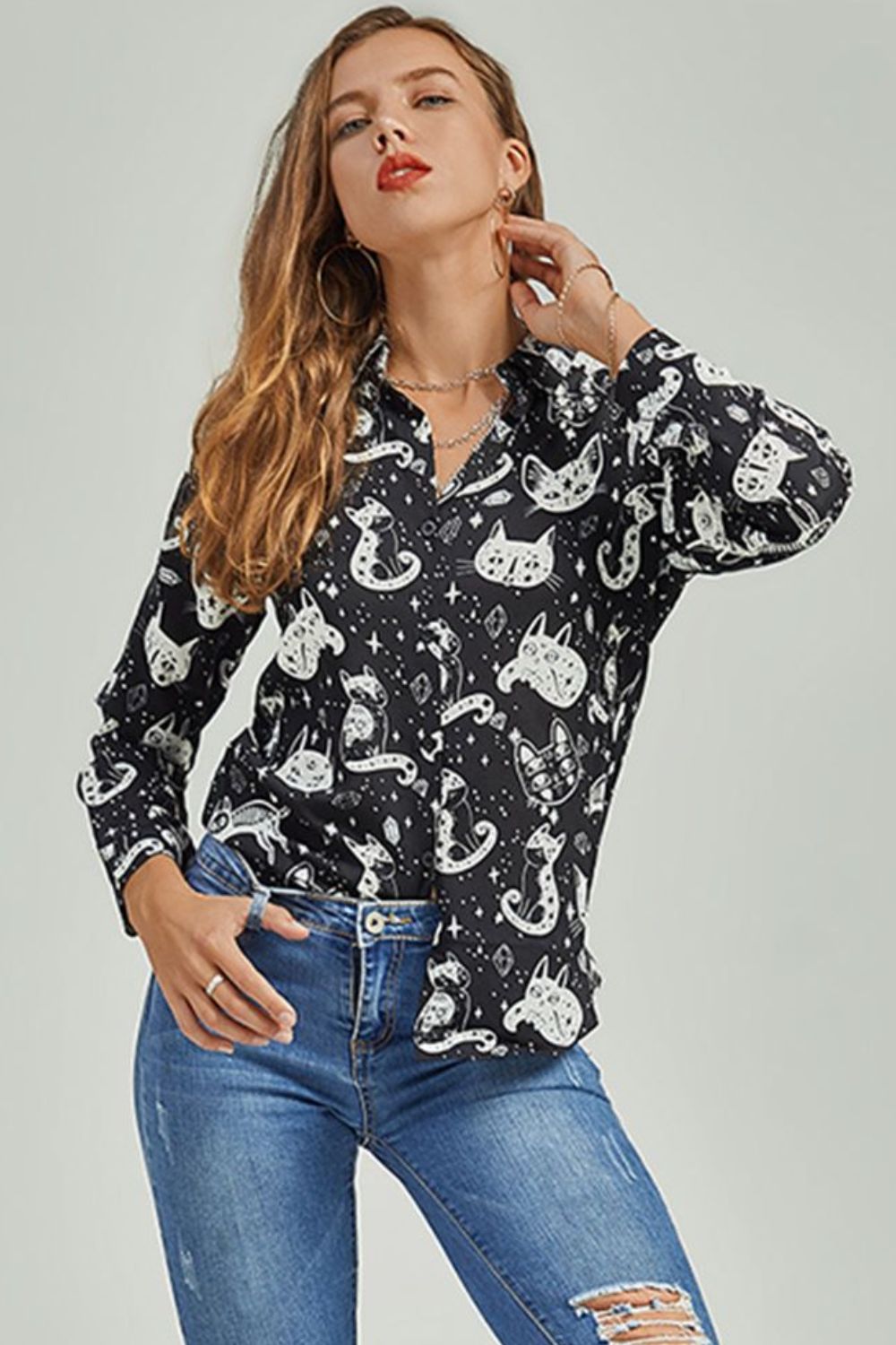 Black celestial cat print button-up blouse with long sleeves