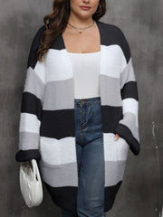 Chunky stripe open-front cocoon cardigan in black, white, and grey acrylic with pockets.
