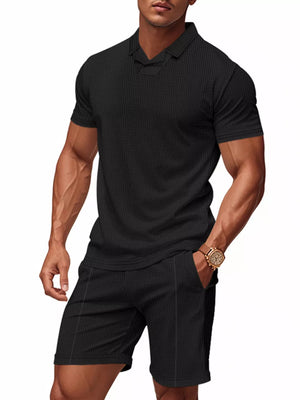 Black waffle knit polo shirt and jogger shorts set for men.
