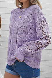 Lavender openwork knit sweater with lace sleeves and crew neck.
