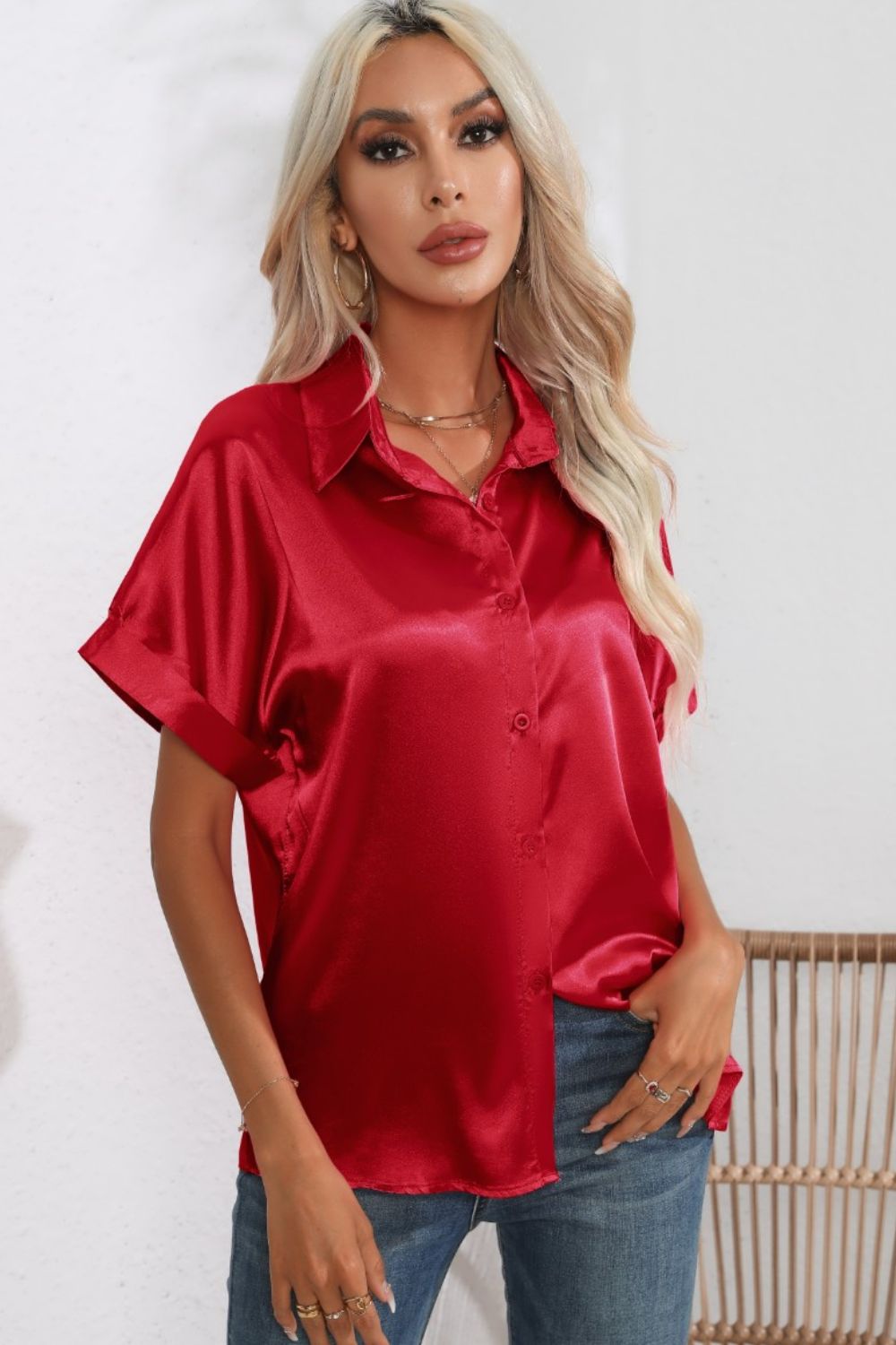 Scarlet satin button-down blouse with cuffed short sleeves.