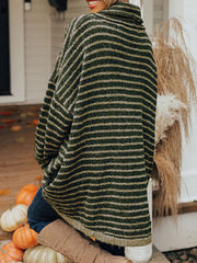 Dark green striped oversized turtleneck sweater with slouch pockets.