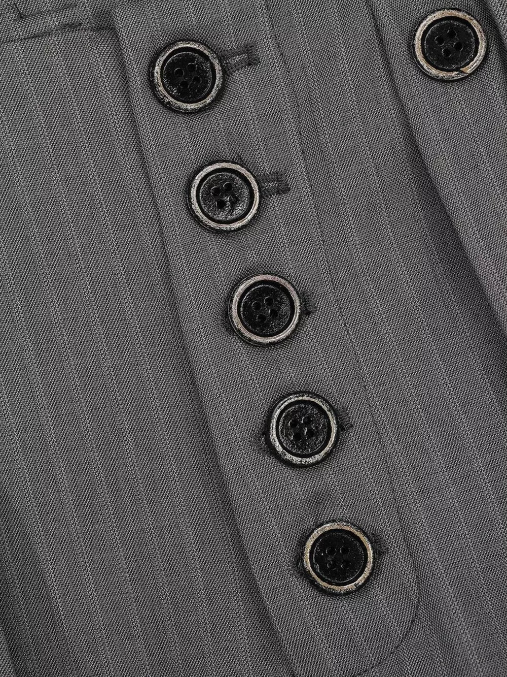Grey pinstripe sweatpants with a buttoned fly detail.