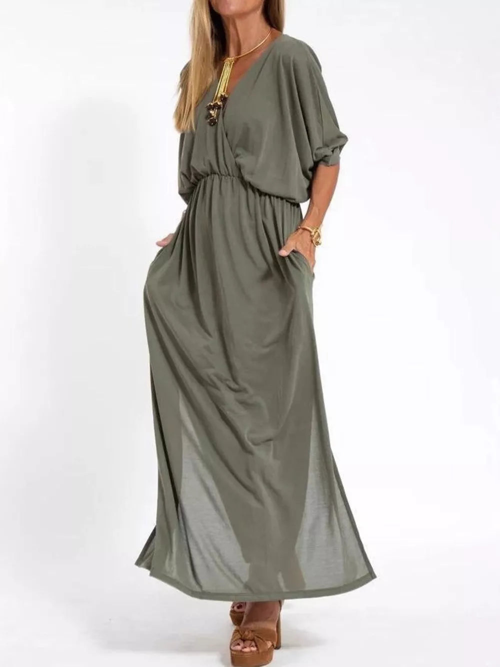 Army green V-neck maxi dress with dolman sleeves, elastic waist, pockets, and side slits.
