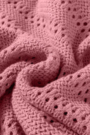 Dusty pink openwork knit hoodie with drawstring detail, cotton blend.