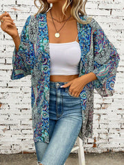Teal paisley print kimono sleeve duster with open front and wide sleeves.