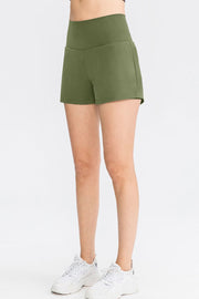 Sculpted high-waist active shorts in Army Green with a comfortable fit.