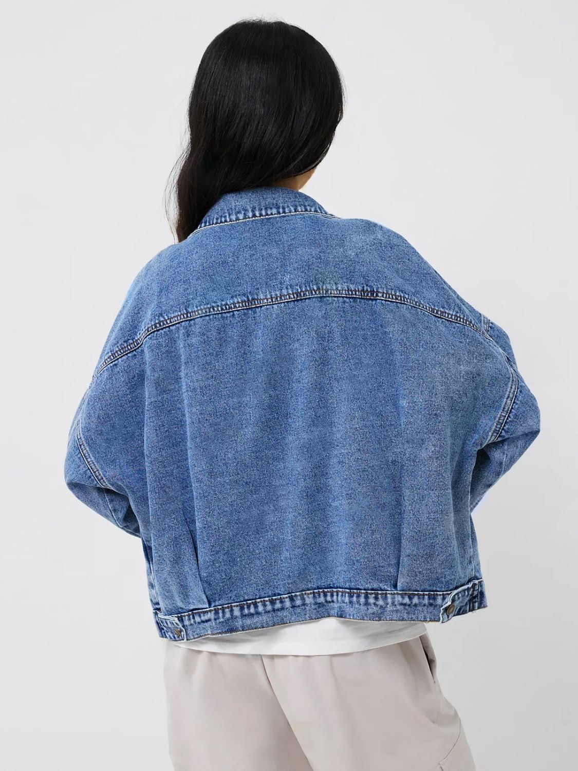 Denim Dream Pocket Shirt in medium wash cotton, classic trucker jacket style with buttoned front and chest pockets.