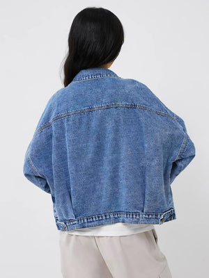 Denim Dream Pocket Shirt in medium wash cotton, classic trucker jacket style with buttoned front and chest pockets.