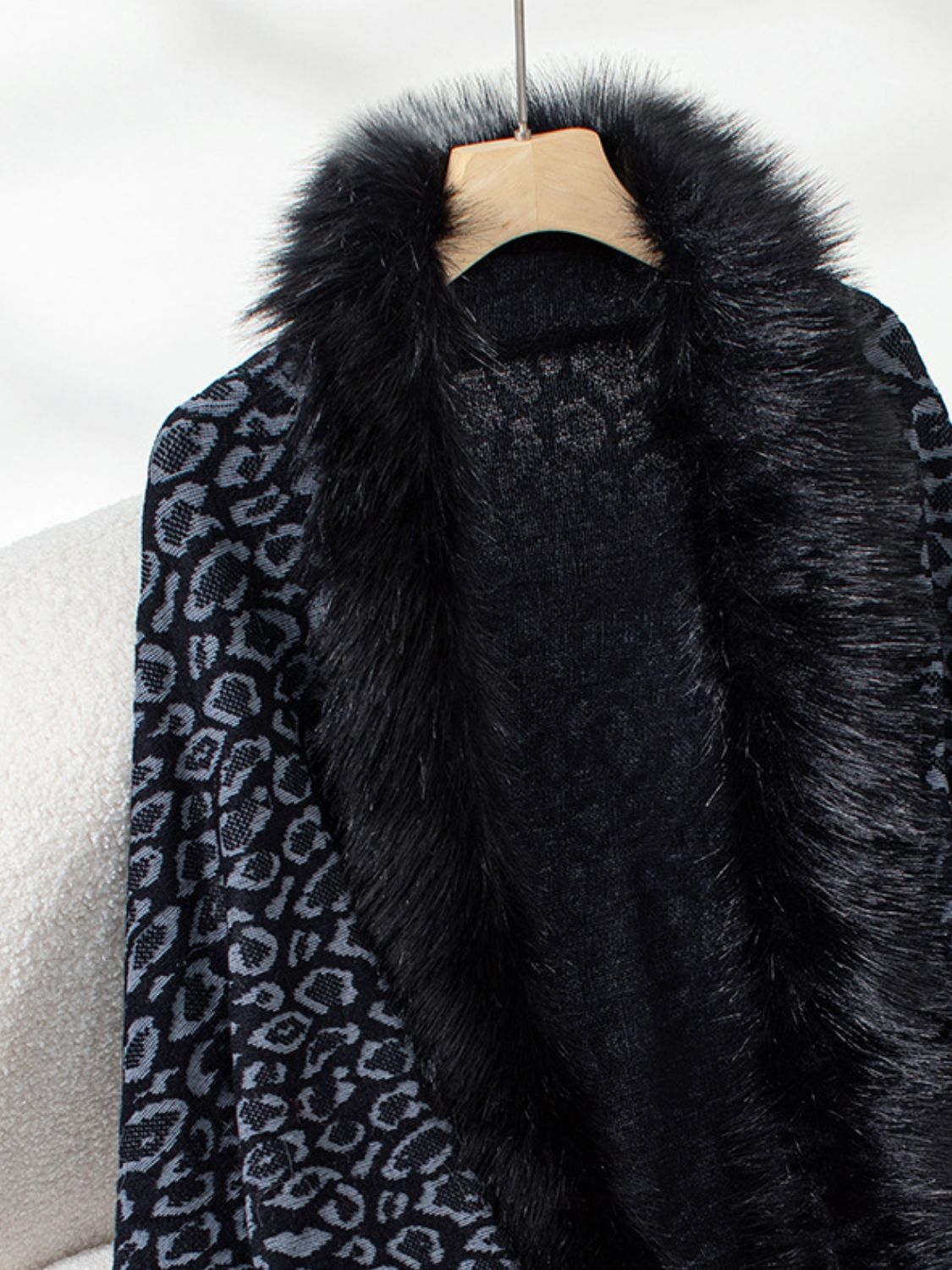 Black leopard print acrylic cardigan with faux fur trim