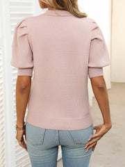 Apricot knit sweater with mock neck and puff sleeves