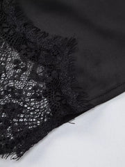 Black lace trim detail on a spaghetti strap dress
