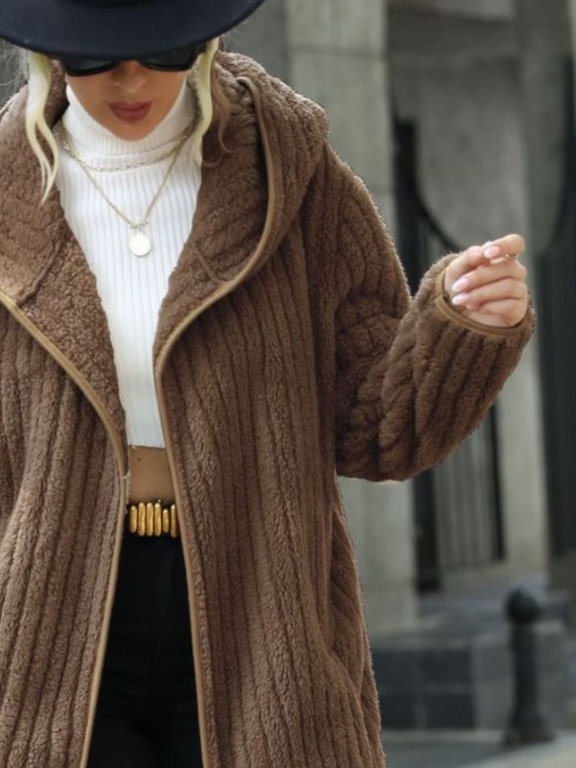 Textured teddy hooded open coat in taupe with ribbed detail and contrast trim.