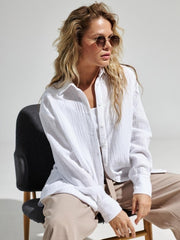White textured cotton overshirt with relaxed fit and button-down front