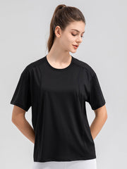 Black performance t-shirt with seam details and short sleeves.