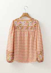 Bohemian floral print blouson sleeve top with button detail
