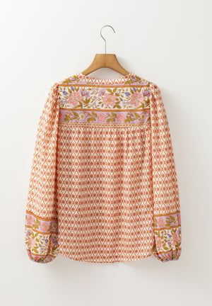 Bohemian floral print blouson sleeve top with button detail