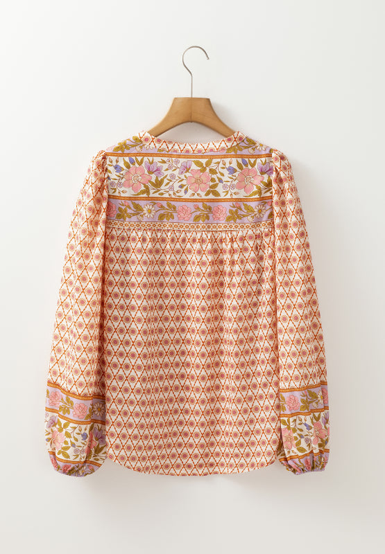 Bohemian floral print blouson sleeve top with button detail