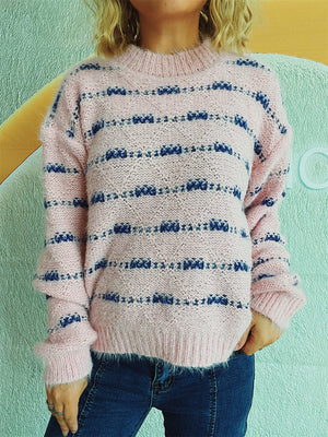 Blush pink crew neck sweater with textured blue stripes and fuzzy acrylic knit.
